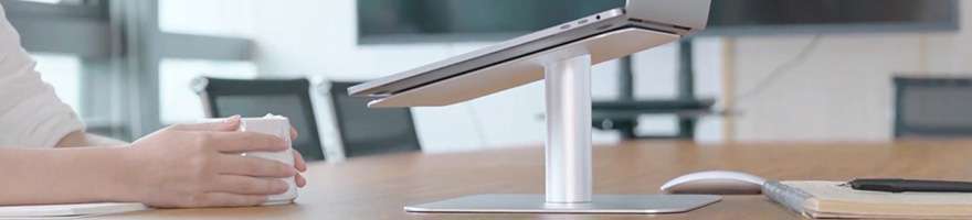 laptop stand on desk