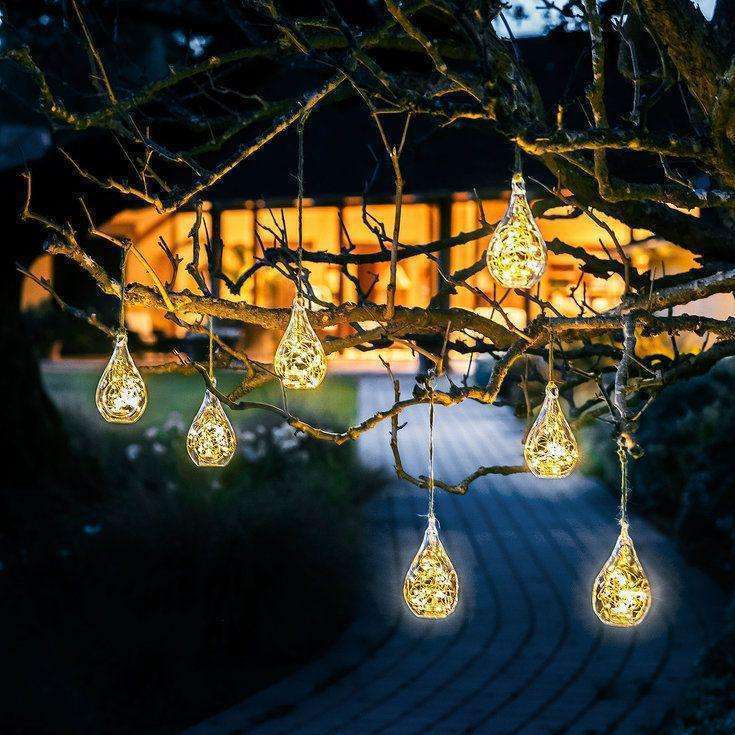 outdoor lighting ideas- lights from trees